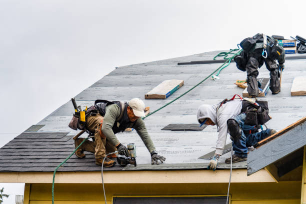 Professional Roofing technician working in Tully, NY